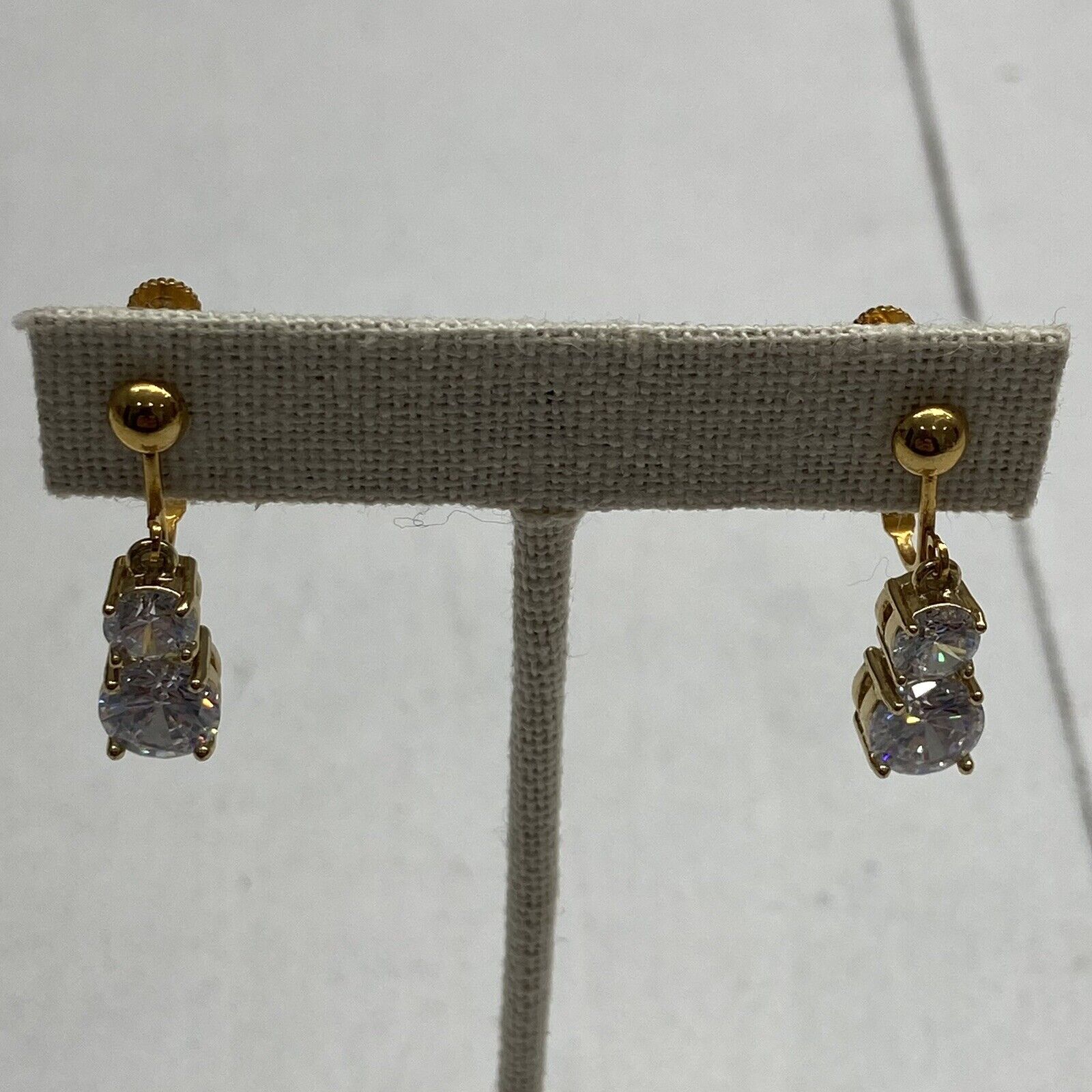 Gold Tone and Crystal Dangle Two Drop Clip On Earrings
