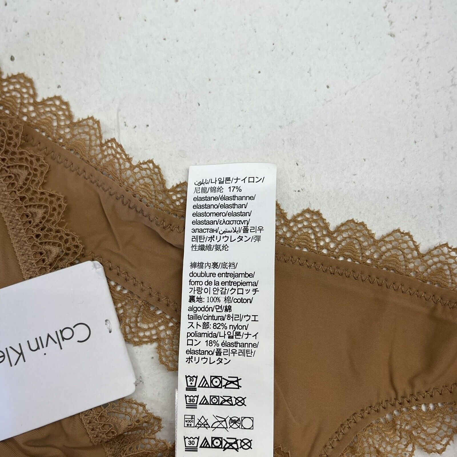 Calvin Klein Beige Lace Trim Thong Women's Size Small New - beyond