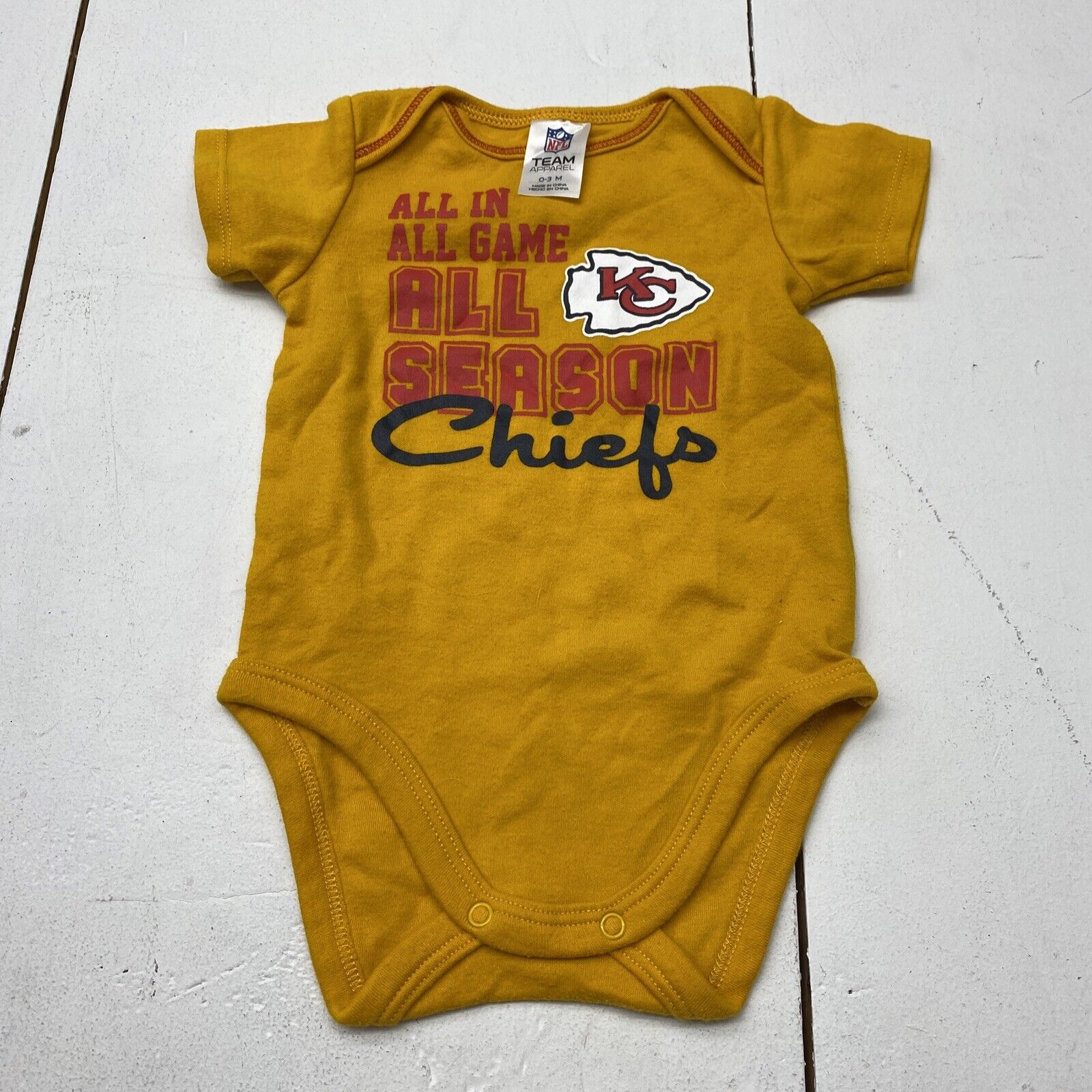 NFL Team Apparel Kansas City Chiefs Gold Baby Short Sleeve Bodysuit 0-3 Months