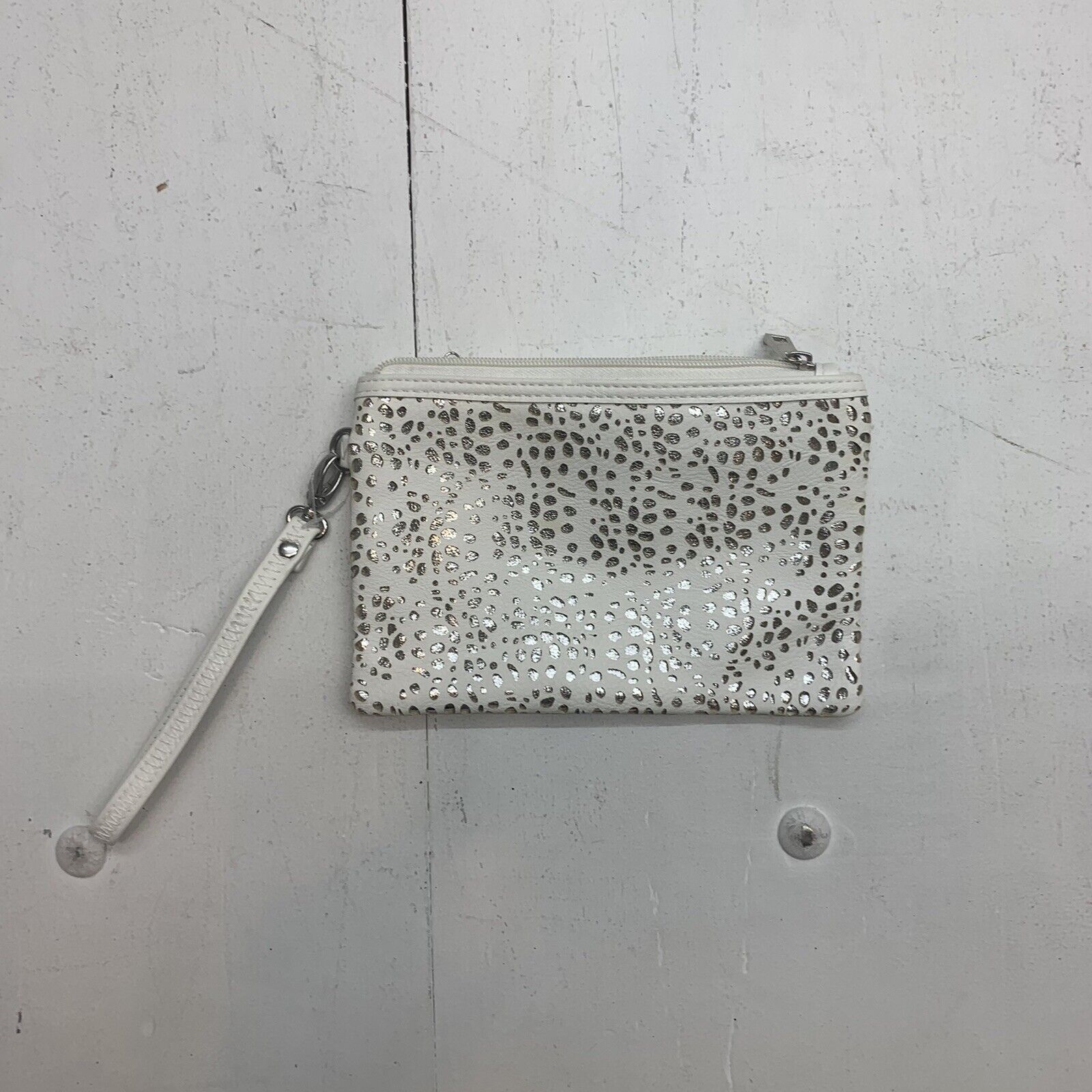 womens White and silver wristlet